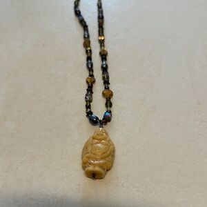 Elegant Beaded Necklace with Buddha Pendant
